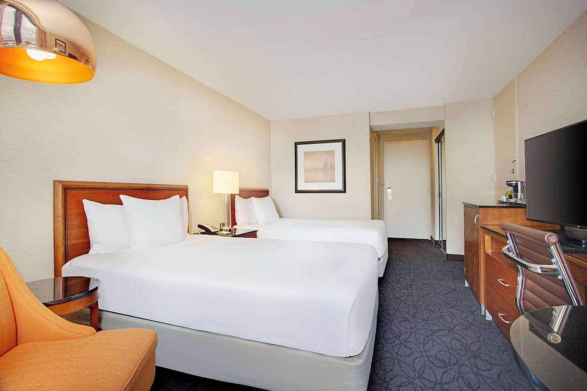 Premium bedding, down duvets, pillow-top beds, in-room safe