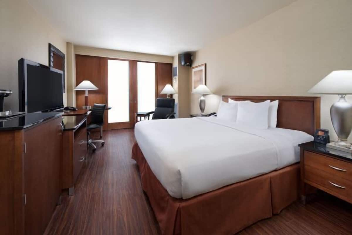 Premium bedding, down duvets, pillow-top beds, in-room safe