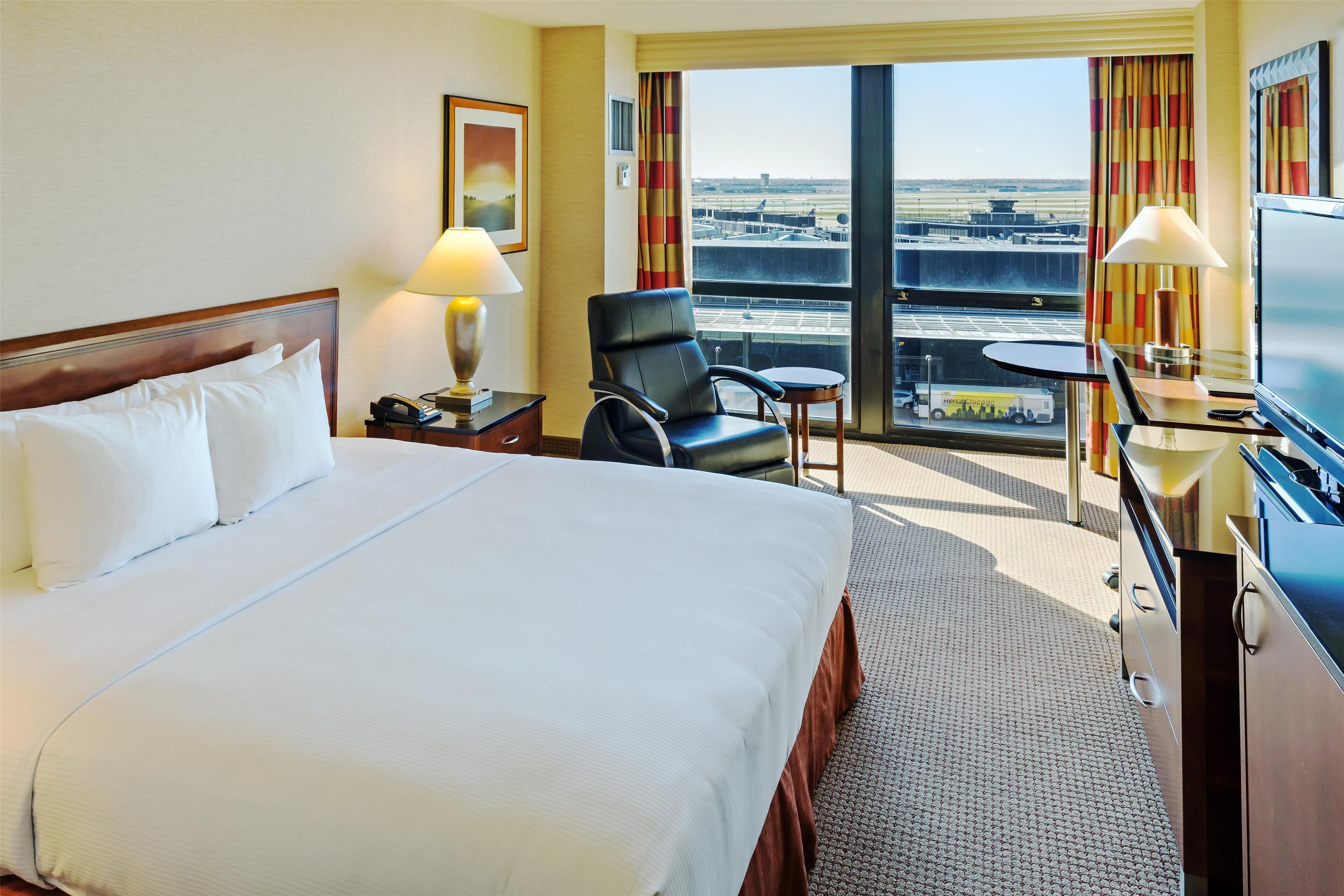 premium bedding, down duvets, pillow-top beds, in-room safe