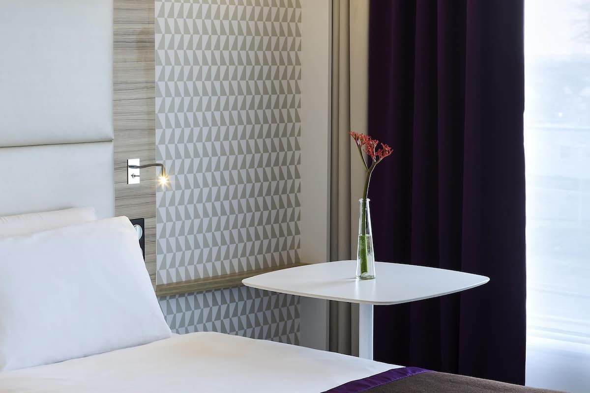 Suite, 1 King Bed with Sofa bed | In-room safe, desk, blackout drapes, soundproofing