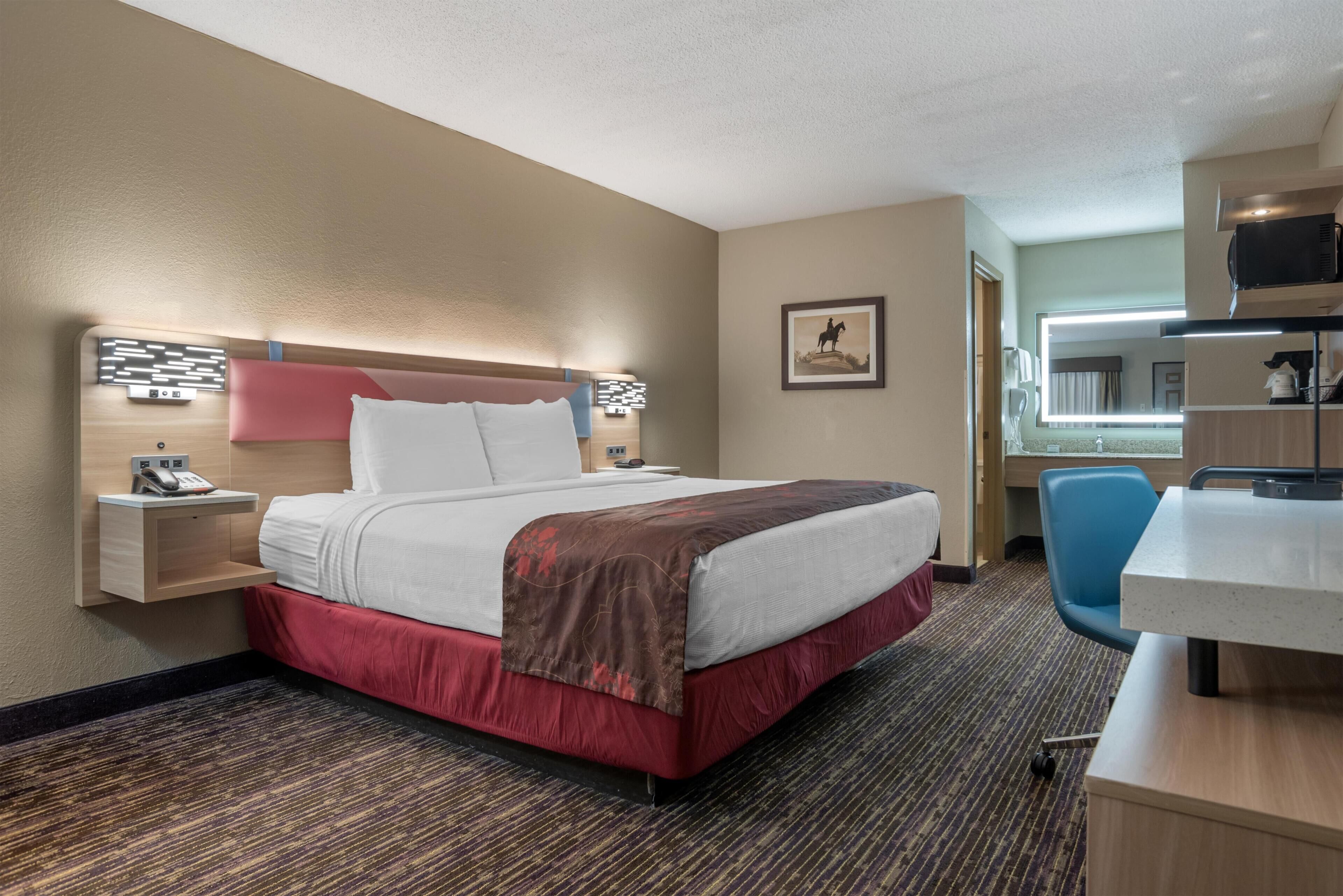 Premium bedding, pillow-top beds, desk, blackout curtains