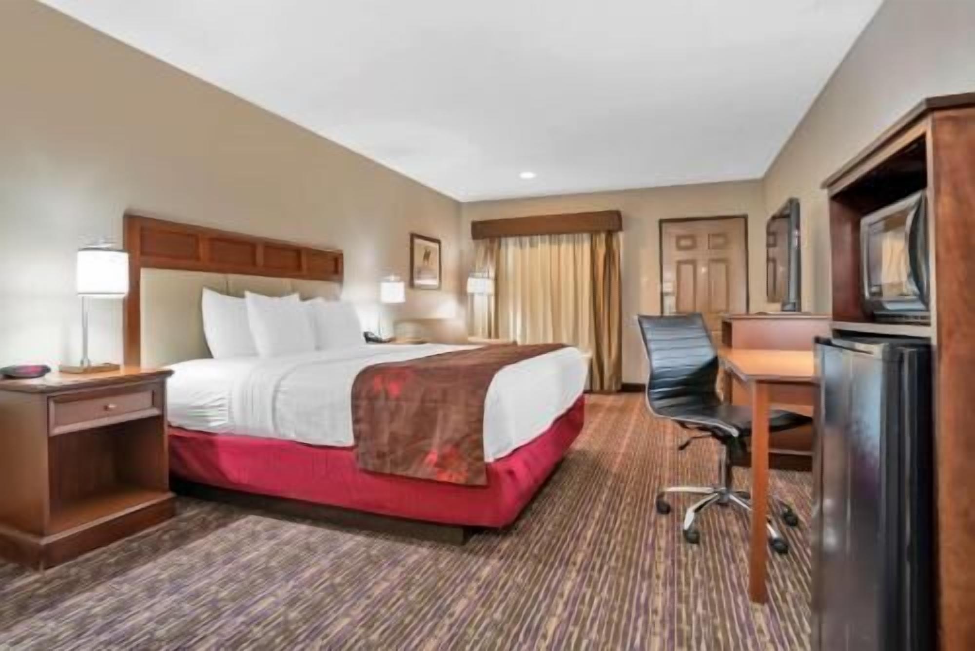 Premium bedding, pillowtop beds, desk, blackout drapes