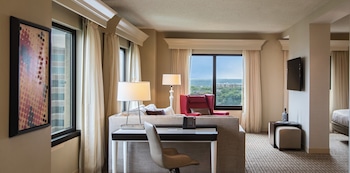 Premium bedding, pillowtop beds, desk, laptop workspace at Renaissance Austin Hotel