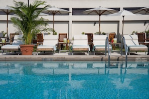 Outdoor pool, pool umbrellas, sun loungers