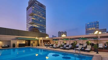 Outdoor pool, pool umbrellas, sun loungers