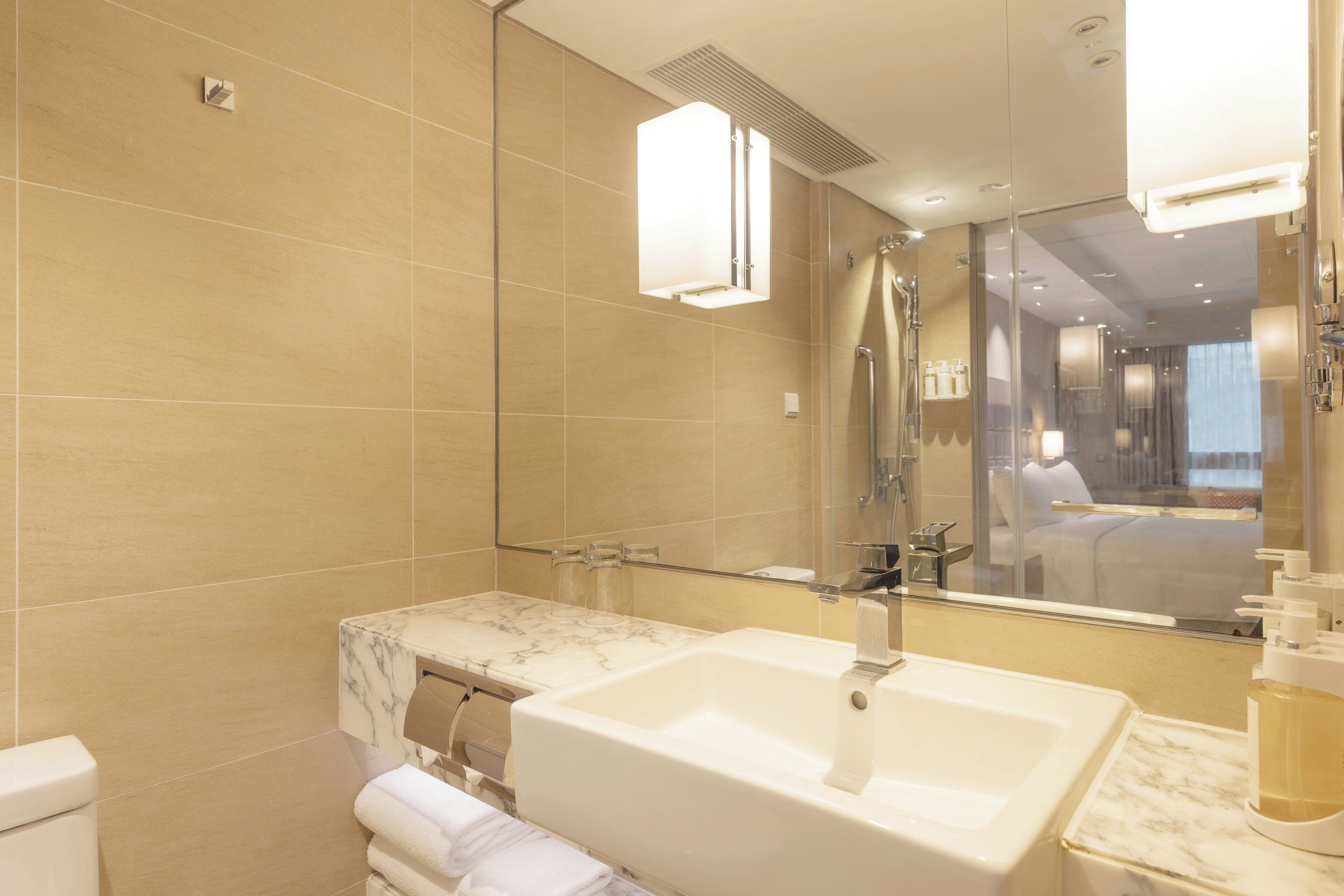 premium room, 1 king bed, club lounge access (high floor) | bathroom | eco-friendly toiletries, hair dryer, bathrobes, slippers