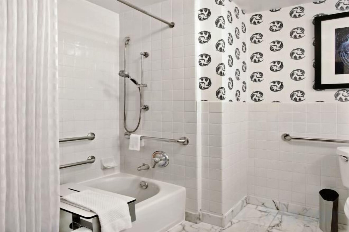 Combined shower/tub, eco-friendly toiletries, hair dryer, towels