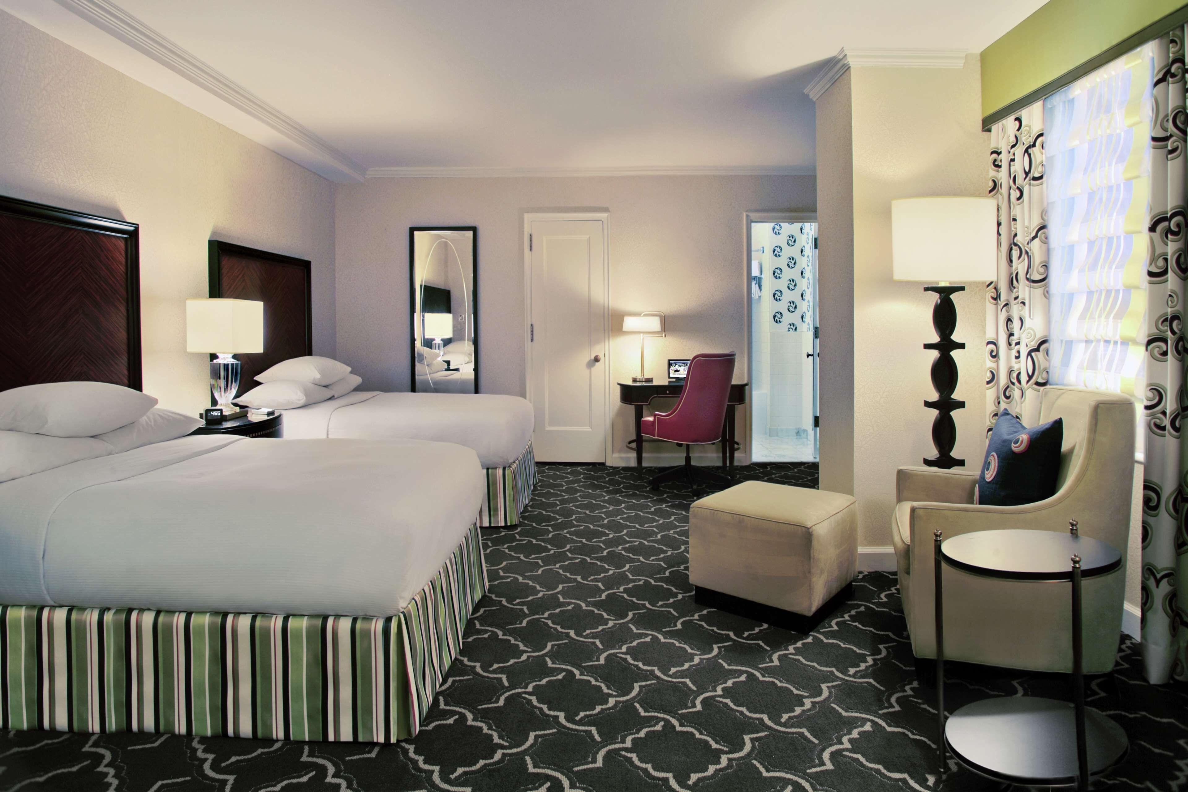 Premium bedding, pillow-top beds, minibar, in-room safe