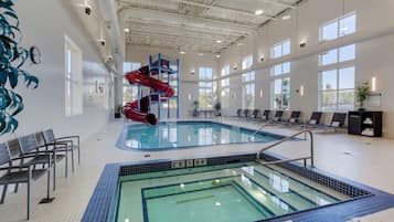 Indoor pool, open 8:00 AM to 11:00 PM, pool loungers