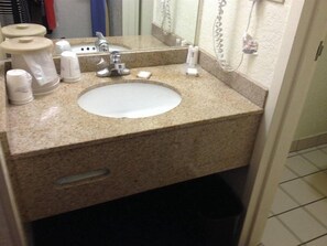 Combined shower/tub, eco-friendly toiletries, hair dryer, towels