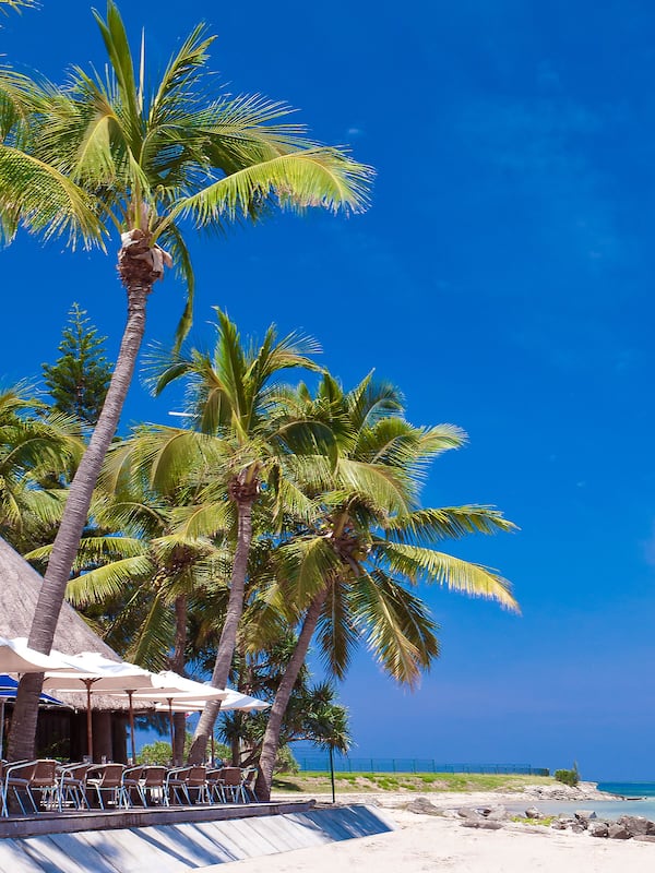 On the beach, sun-loungers, beach umbrellas, beach towels