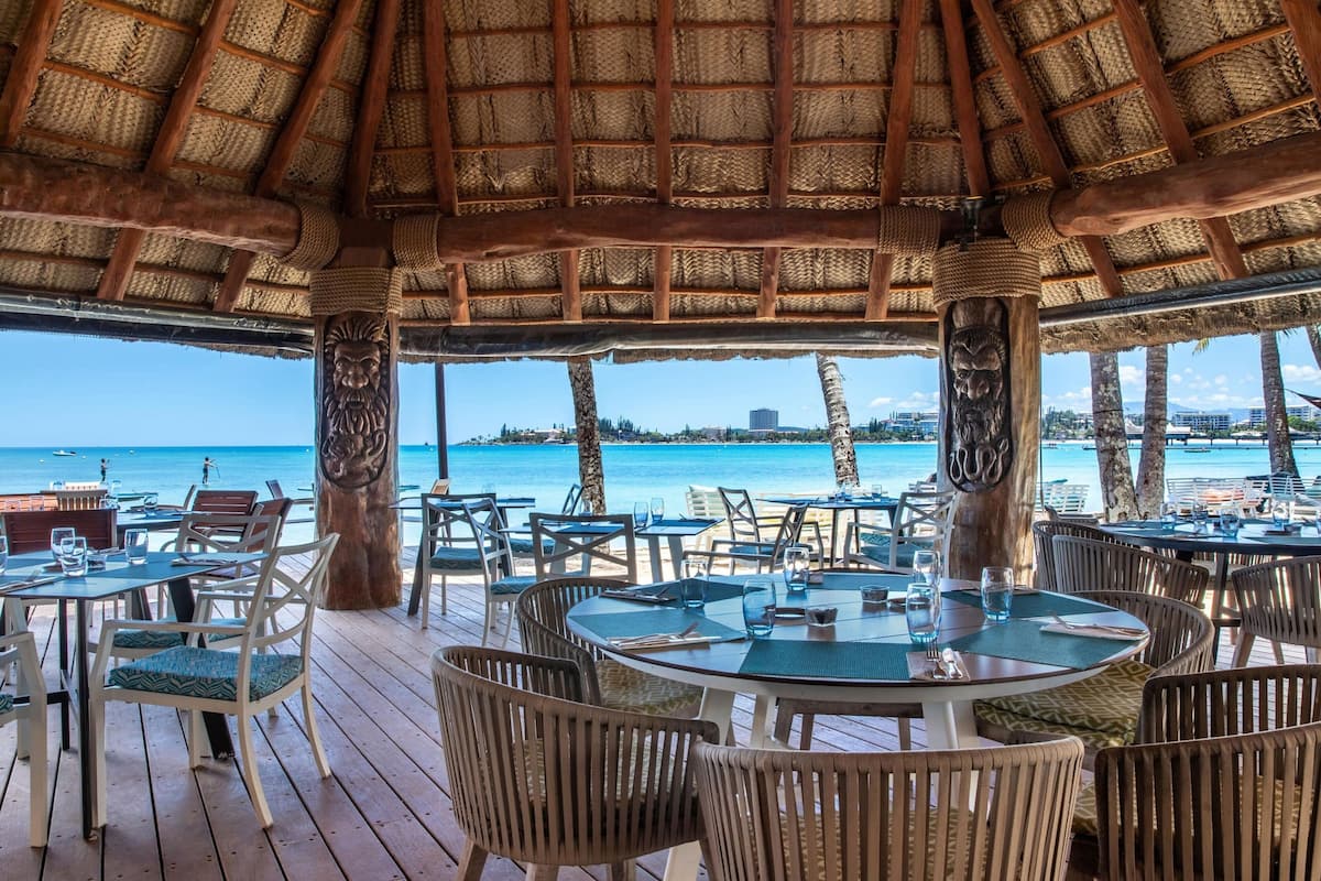 on the beach, sun-loungers, beach umbrellas, beach towels