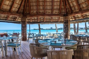 On the beach, sun-loungers, beach umbrellas, beach towels