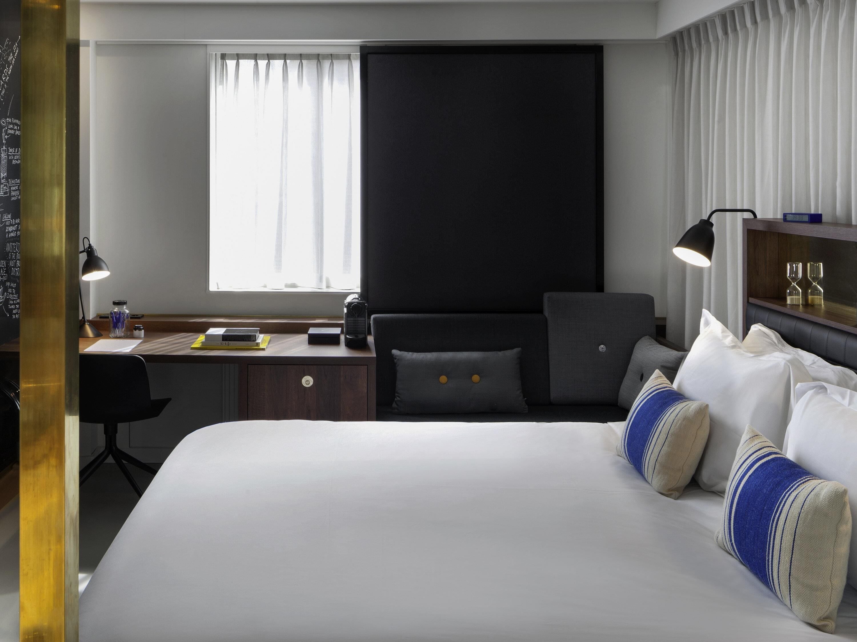 Frette Italian sheets, premium bedding, down comforters, minibar