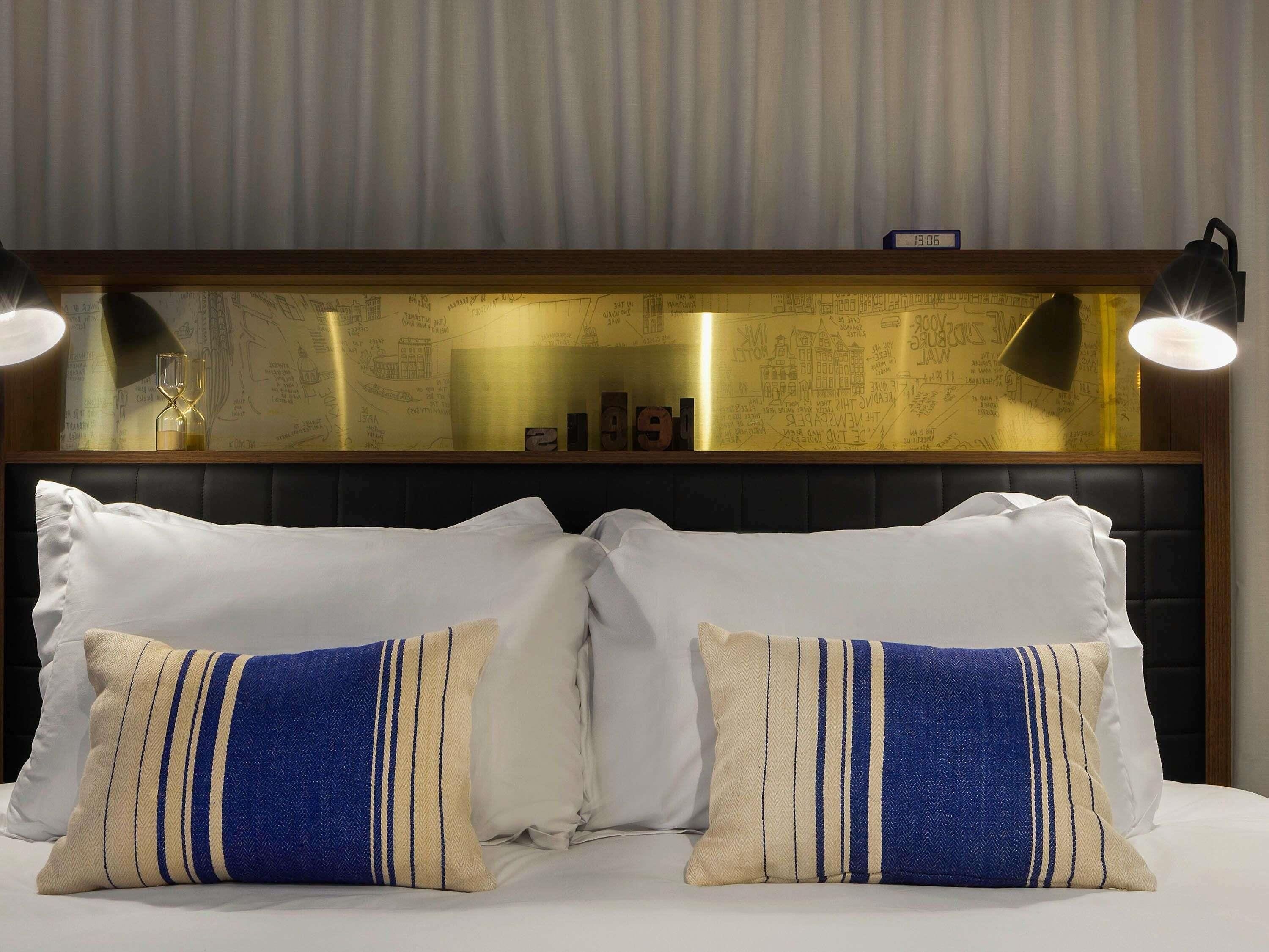 Frette Italian sheets, premium bedding, down comforters, minibar