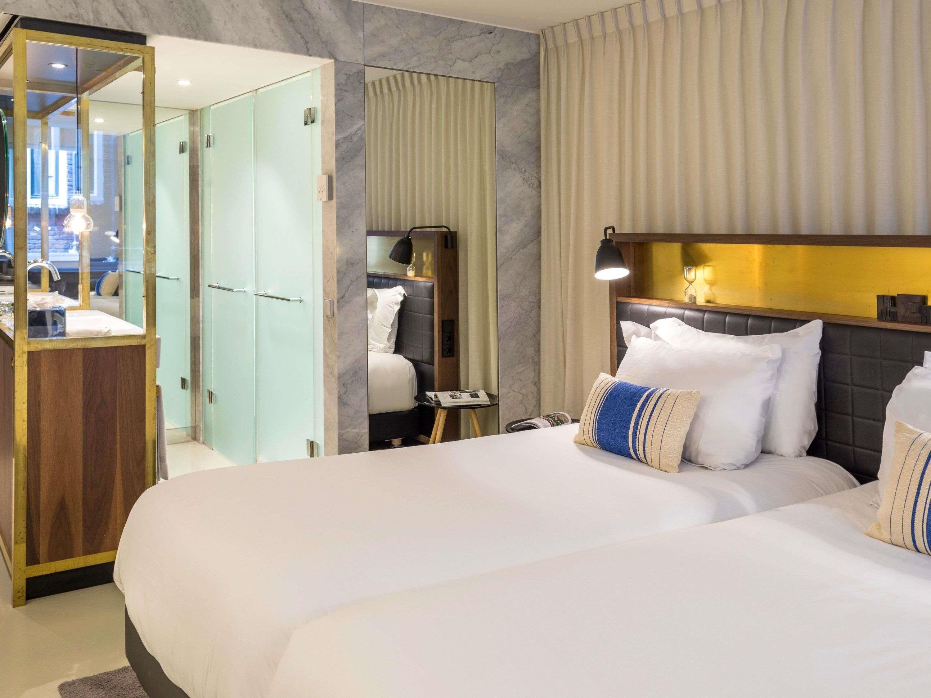 Frette Italian sheets, premium bedding, down comforters, minibar