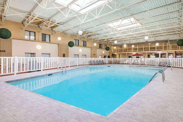 Indoor pool, open 8:00 AM to 11:00 PM, pool umbrellas