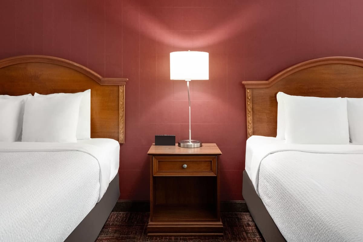 Room, 2 Queen Beds, Accessible, Non Smoking (Mobility, Roll-In Shower) | Desk, blackout drapes, iron/ironing board, cribs/infant beds