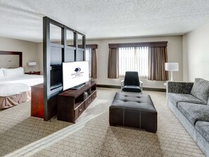 Junior Suite, 1 King Bed | Living area | 55-inch LED TV with digital channels, TV