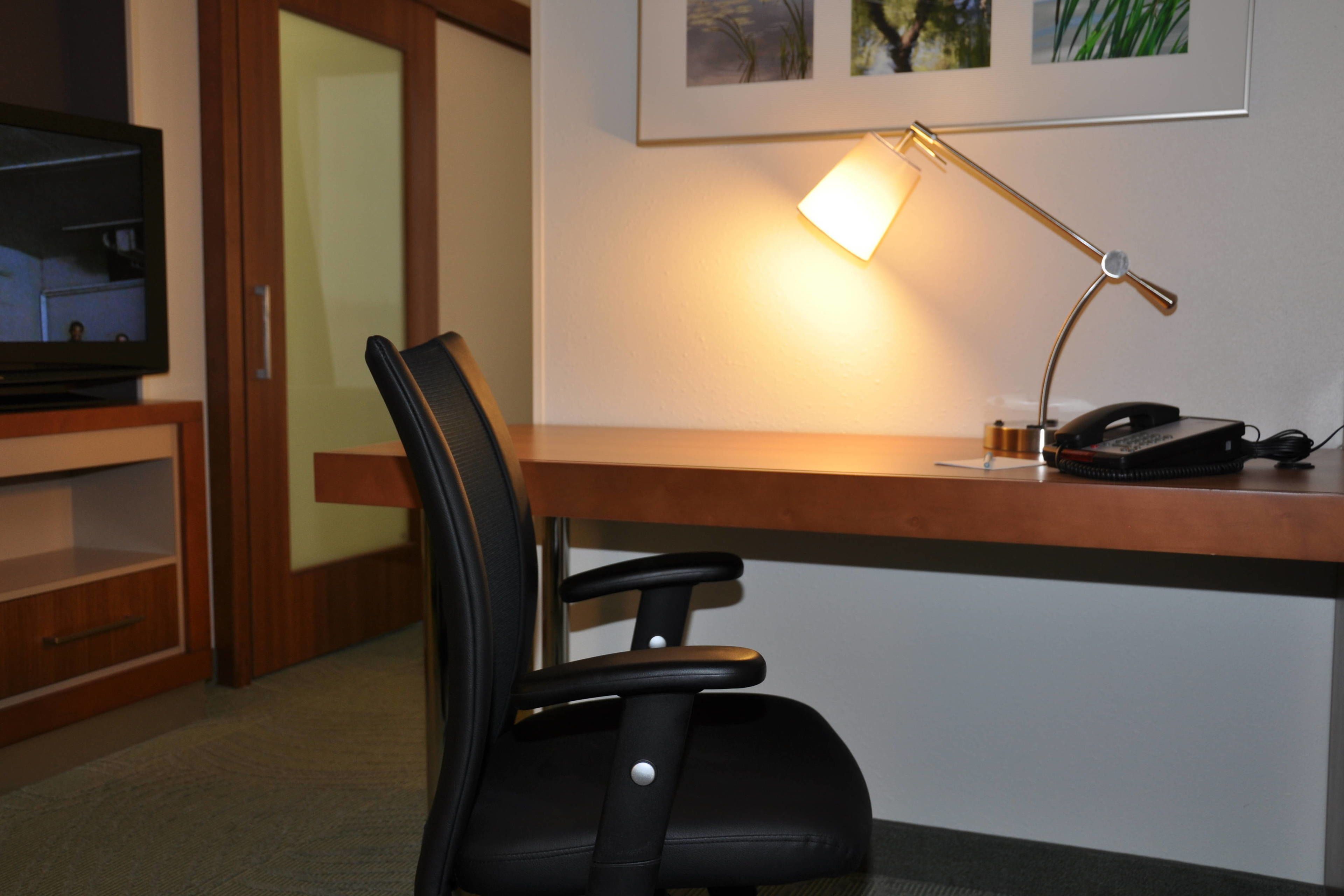 desk, laptop workspace, blackout curtains, iron/ironing board