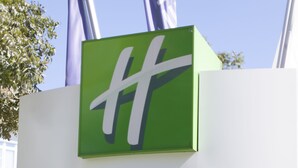 A Holiday Inn sign with the logo and name, address, and website. - Holiday Inn Munich-Unterhaching by IHG (Unterhaching)