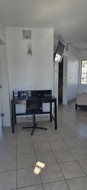 Suite Deluxe | Área de sala de estar | Smart TV