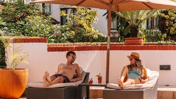 Outdoor pool, pool umbrellas, pool loungers