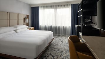 Premium bedding, down duvets, in-room safe, desk