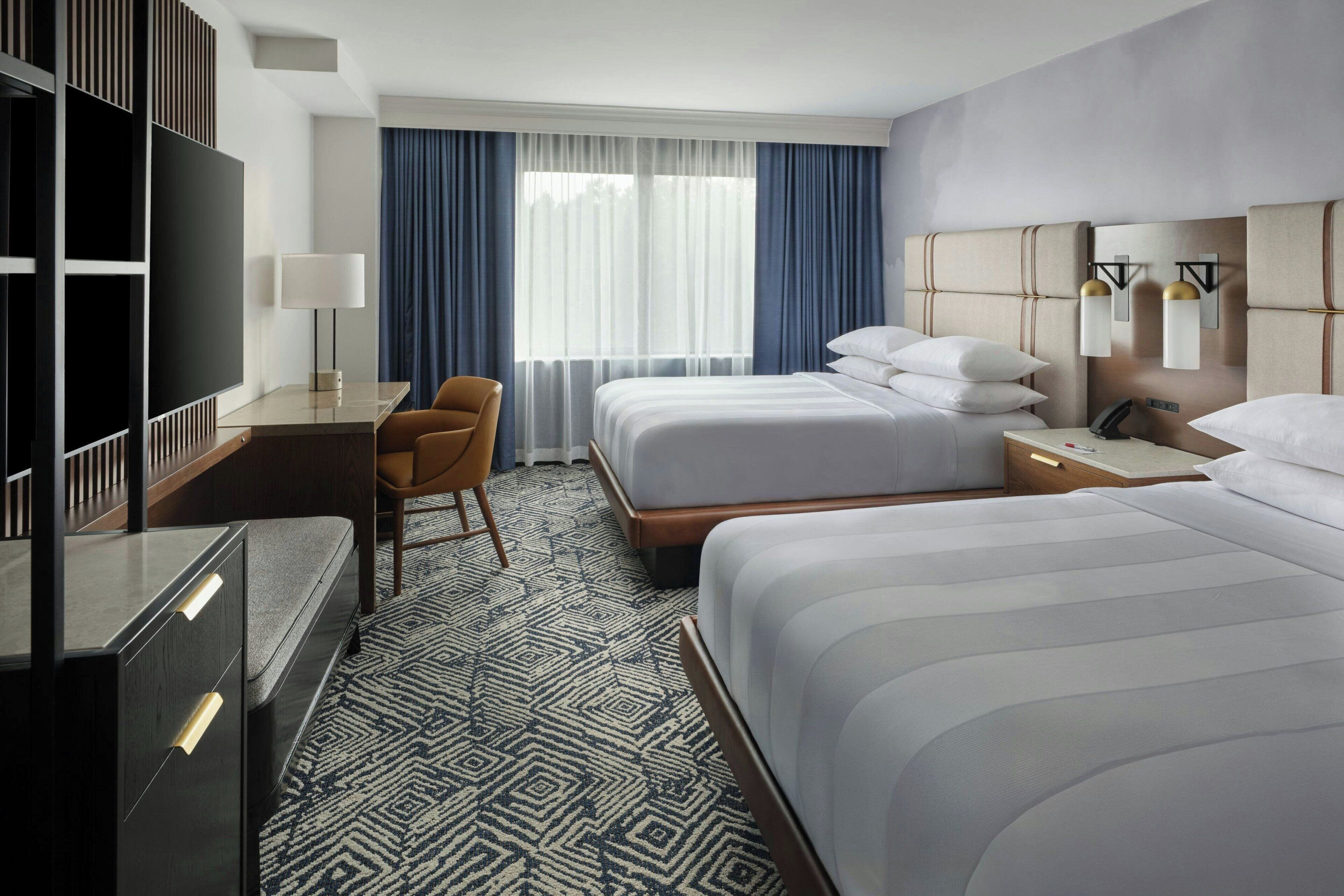 Premium bedding, down comforters, in-room safe, desk