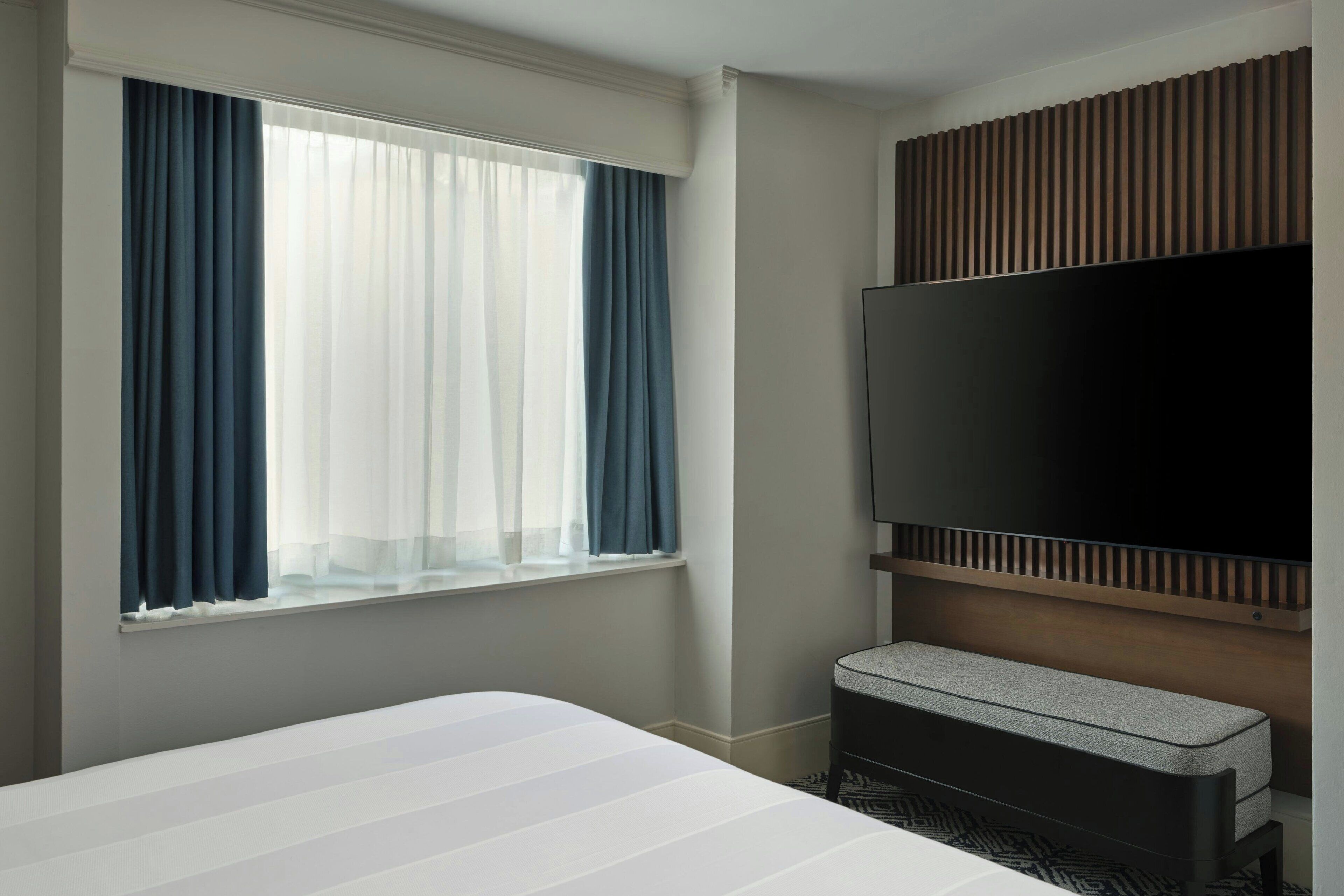 Premium bedding, down comforters, in-room safe, desk