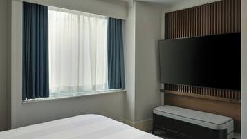 Premium bedding, down comforters, in-room safe, desk