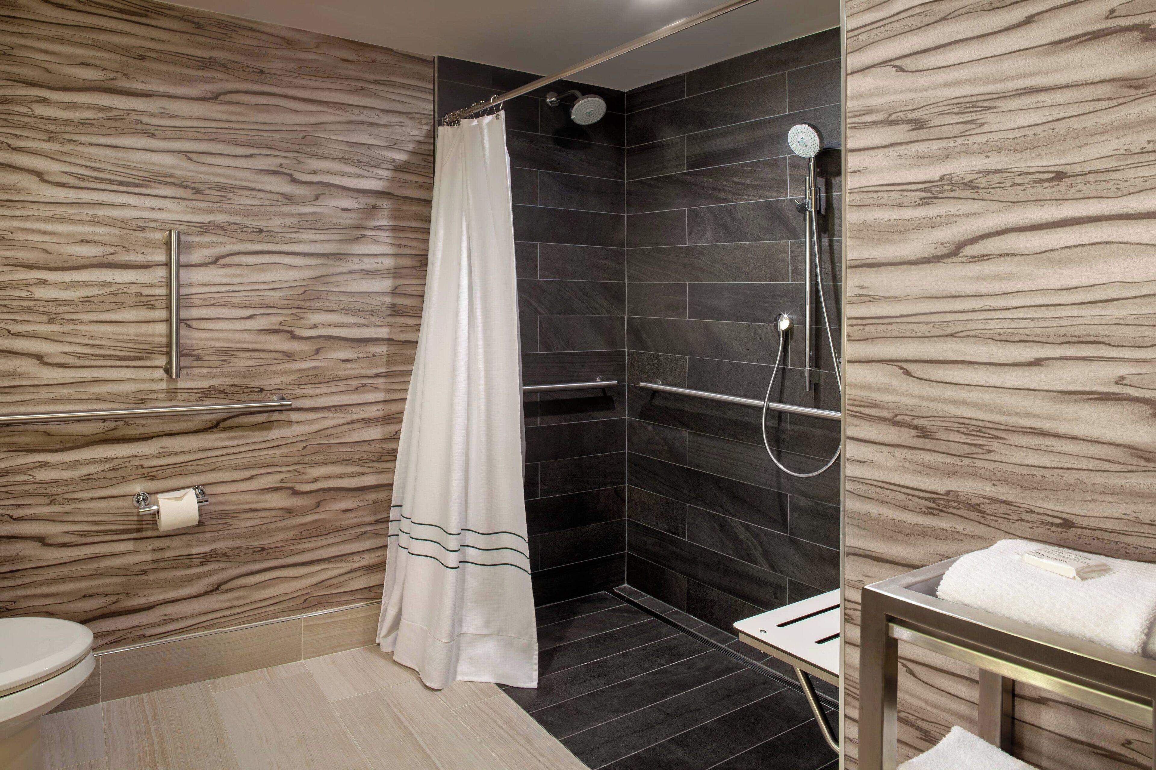 combined shower/bathtub, free toiletries, hair dryer, towels