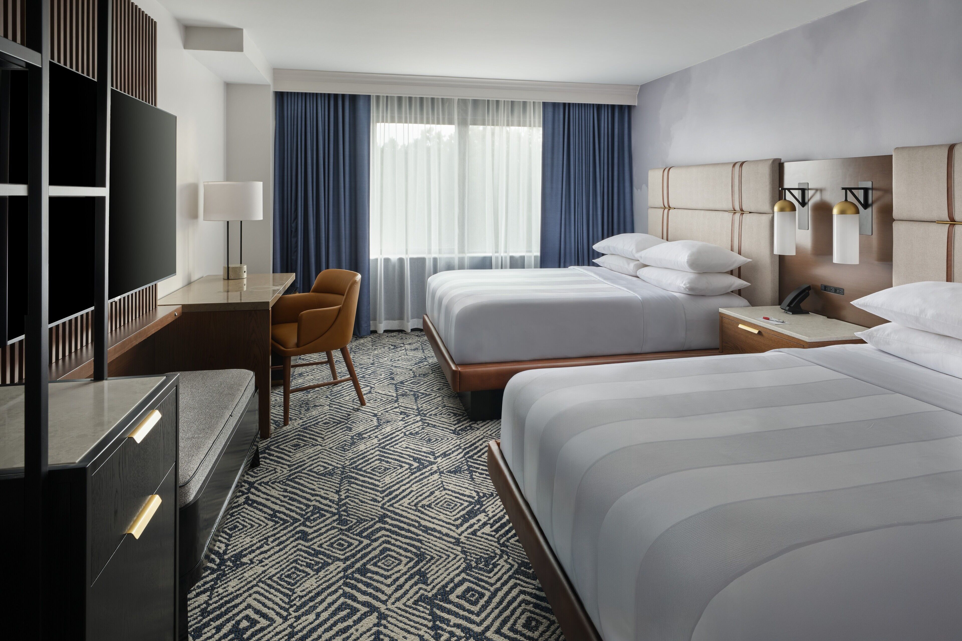 Premium bedding, down comforters, in-room safe, desk