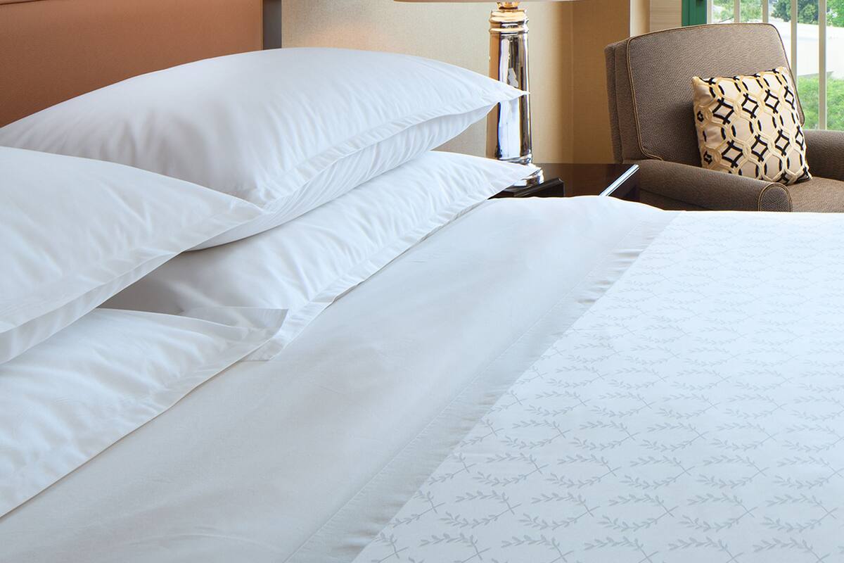 Premium bedding, pillowtop beds, in-room safe, blackout drapes