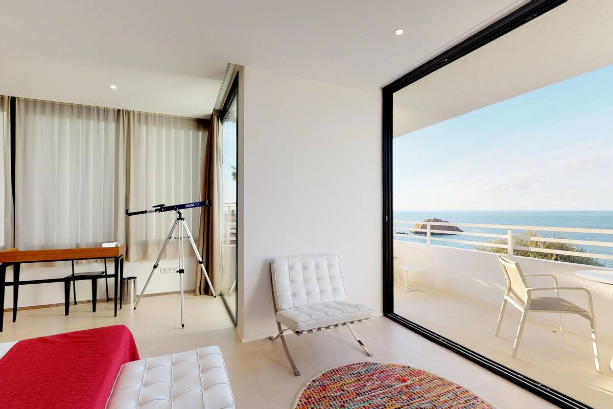 junior suite, 1 queen bed, balcony, bay view | hypo-allergenic bedding, in-room safe, desk, blackout curtains