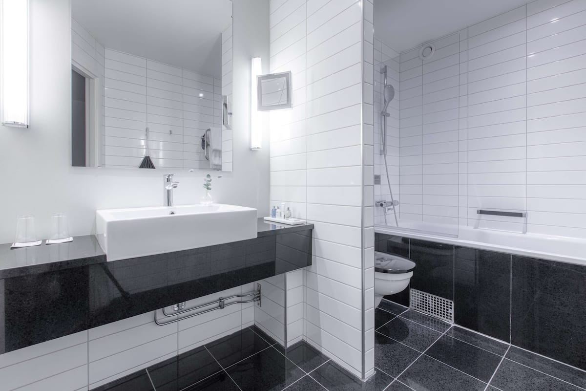 premium room | bathroom | shower, eco-friendly toiletries, hair dryer, towels