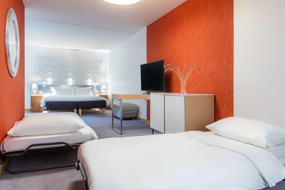 Family Room | Hypo-allergenic bedding, minibar, in-room safe, desk