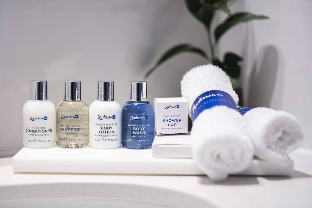 shower, eco-friendly toiletries, hair dryer, towels