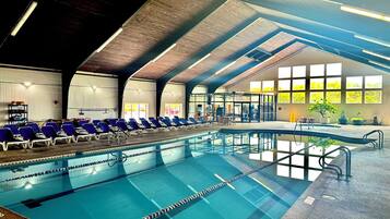 Indoor pool, seasonal outdoor pool, pool umbrellas, pool loungers