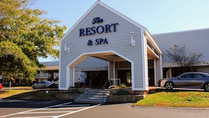 A building with a sign reading "The Resort & Spa". - Cape Cod Irish Village (Hyannis)