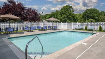 Seasonal outdoor pool, open 8 AM to 8 PM, pool umbrellas, pool loungers