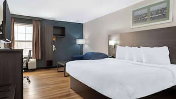 Suite, 1 King Bed, Non Smoking, Kitchenette (with Sofabed) | In-room safe, desk, laptop workspace, blackout drapes