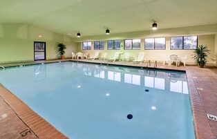 Indoor pool, open 10:00 AM to 10:00 PM, sun loungers