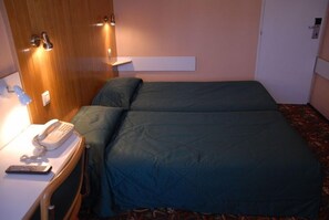 Desk, blackout curtains, iron/ironing board, free cots/infant beds