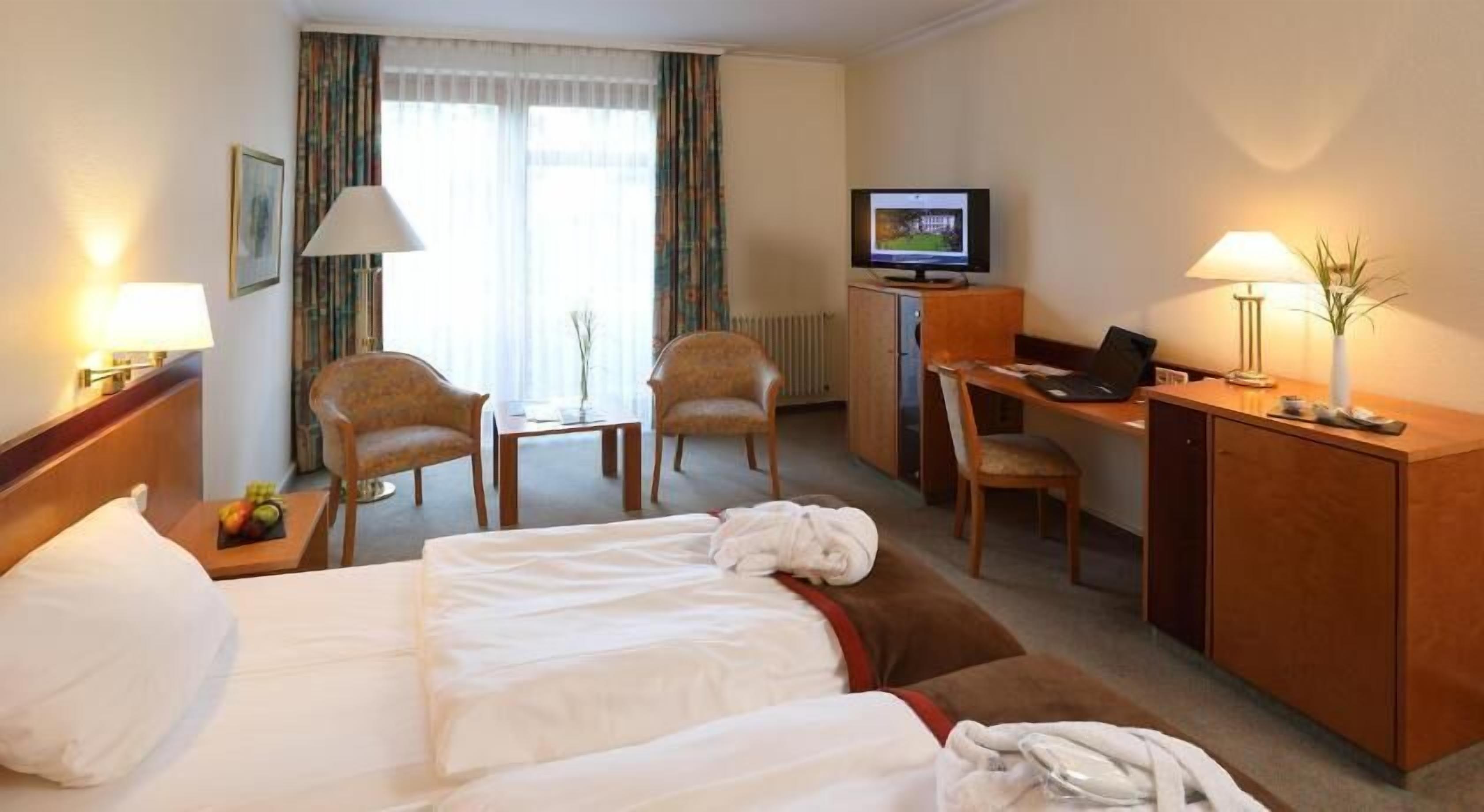 Hypo-allergenic bedding, in-room safe, desk, laptop workspace