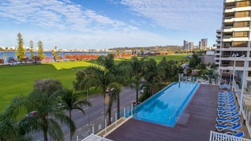 Outdoor pool, open 6:30 AM to 10:00 PM, free cabanas, pool umbrellas