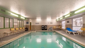 An indoor swimming pool with clear signage, including "NO DIVING" and "NO LIFEGUARD ON DUTY". - Wingate by Wyndham Great Falls (Great Falls)