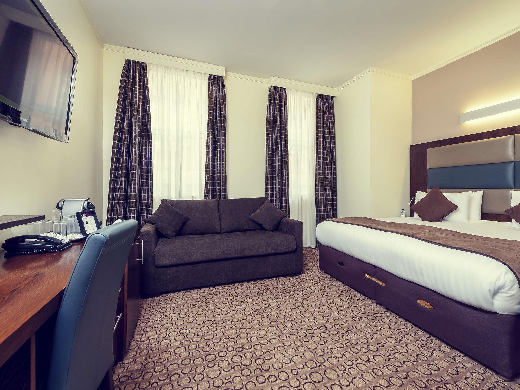In-room safe, desk, laptop workspace, blackout curtains