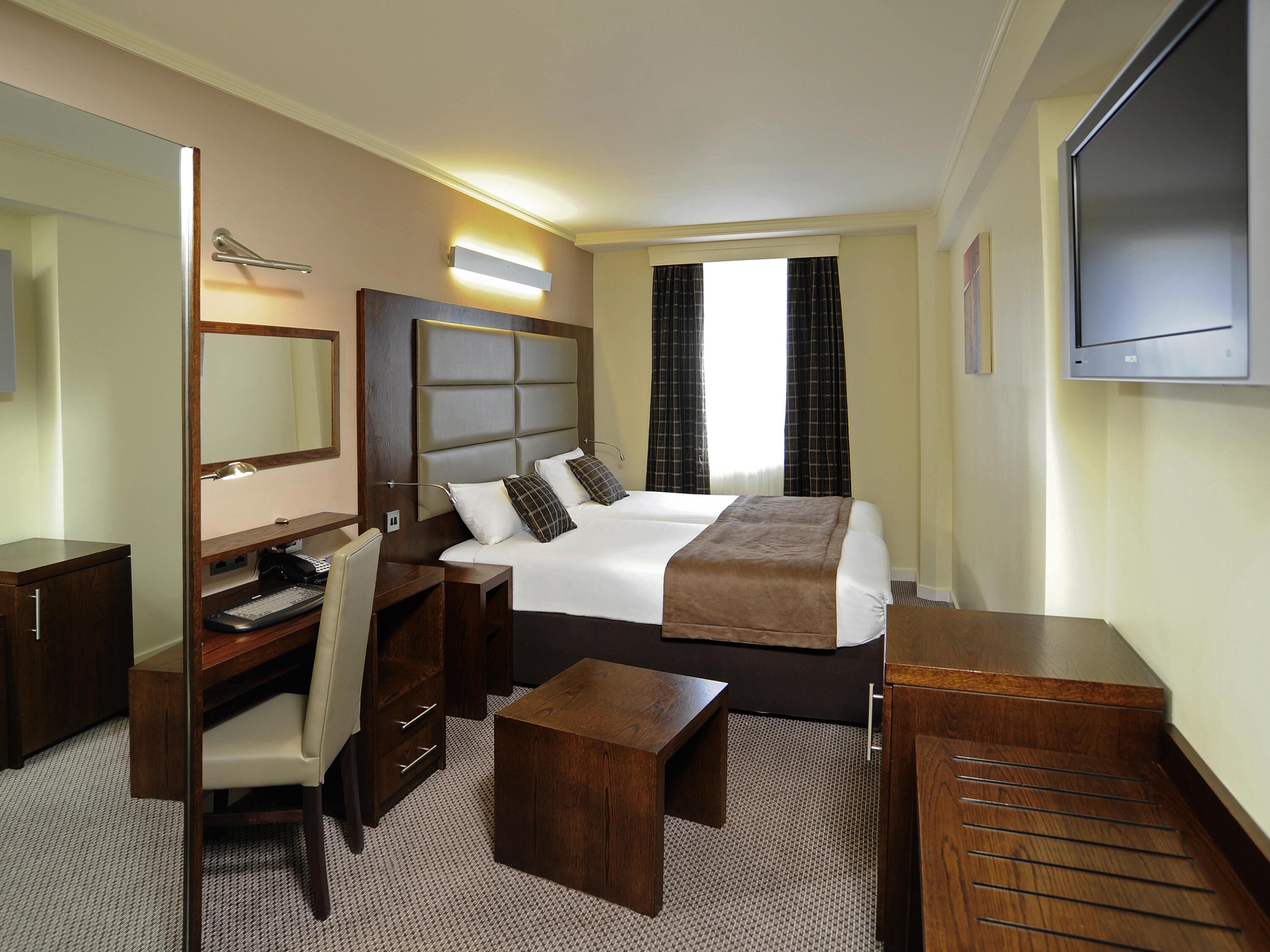 Standard Room, 2 Twin Beds | In-room safe, individually decorated, individually furnished, desk