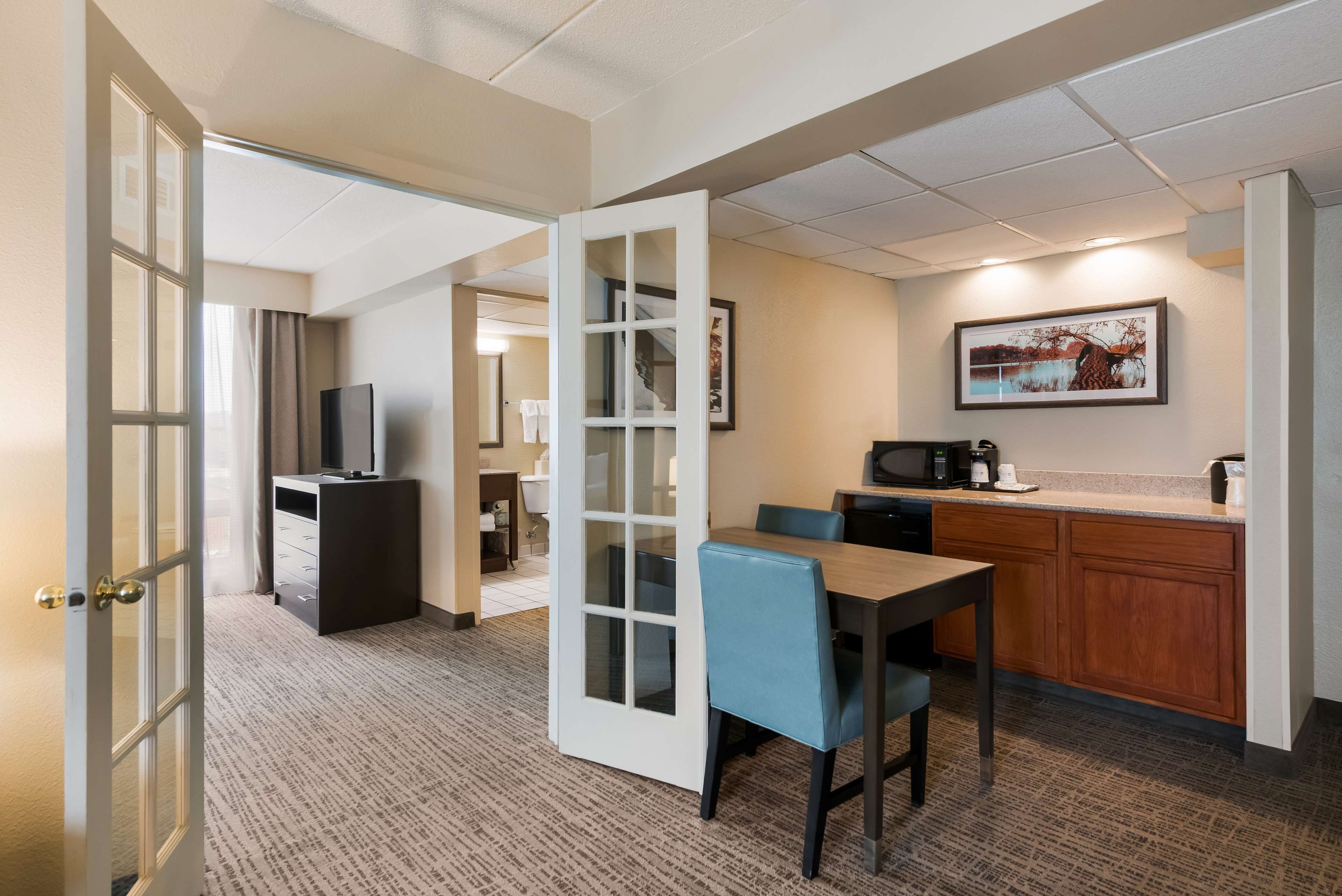 Suite, 1 King Bed, Non Smoking, Refrigerator & Microwave | In-room safe, soundproofing, iron/ironing board, rollaway beds